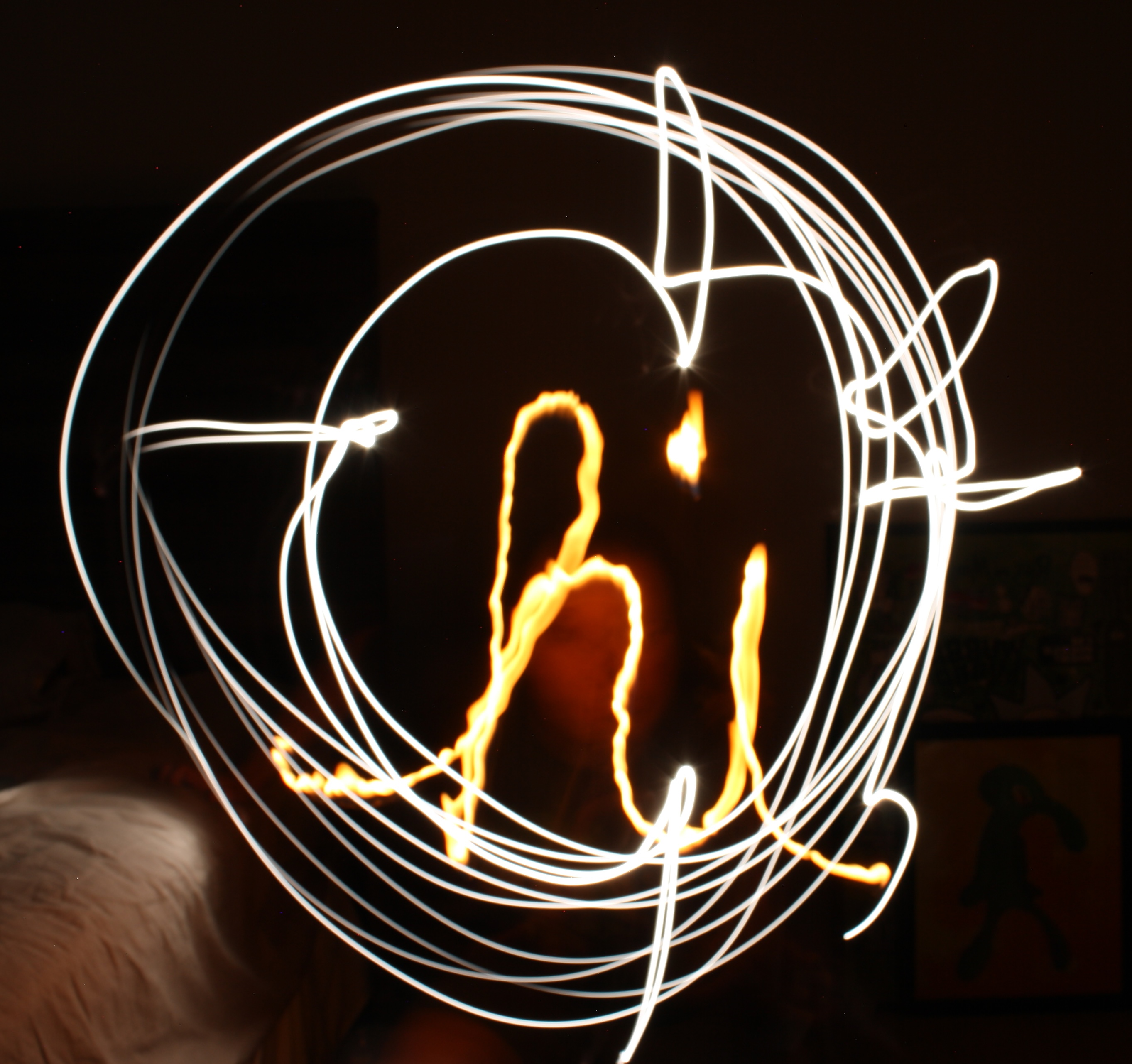 Light Painting of the word Hi with a Lighter and Phone